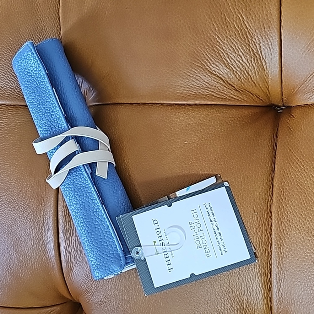 Threshold roll up technology pencil pouch